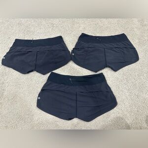 THREE PAIRS of Lululemon Speed Up low rise shorts 2”
